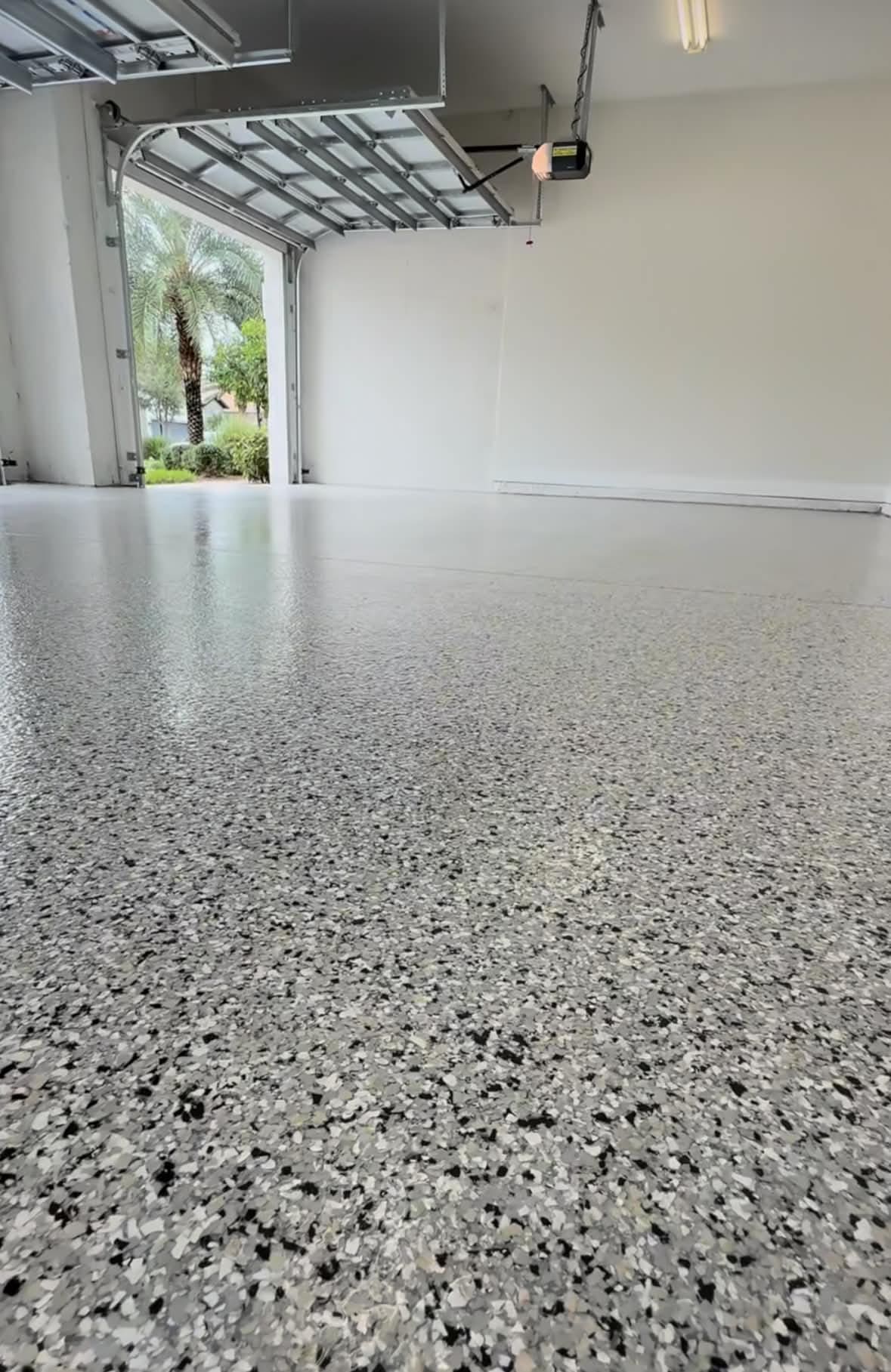 Wide garage with palm trees